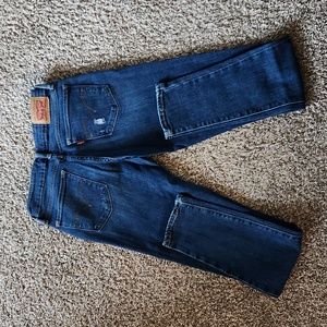Levi 711 skinny, size 26 length 30, dark destruction wash.